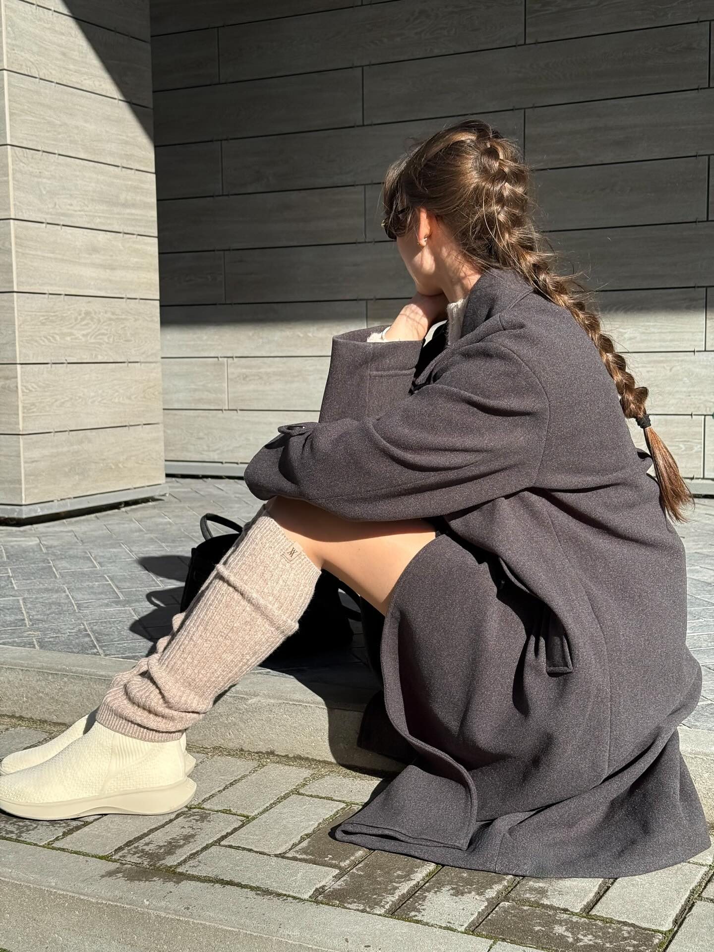 VIVAIA — knit sneakers and flats, city daylight, frame 1