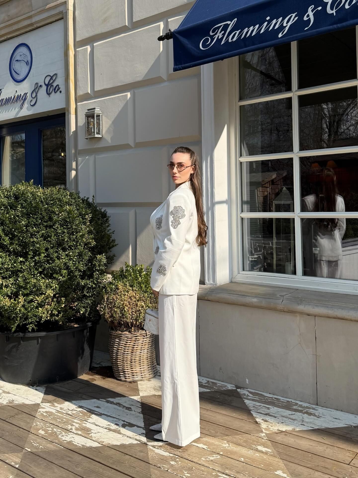 Bella Barnett — ivory embellished suit, frame 1