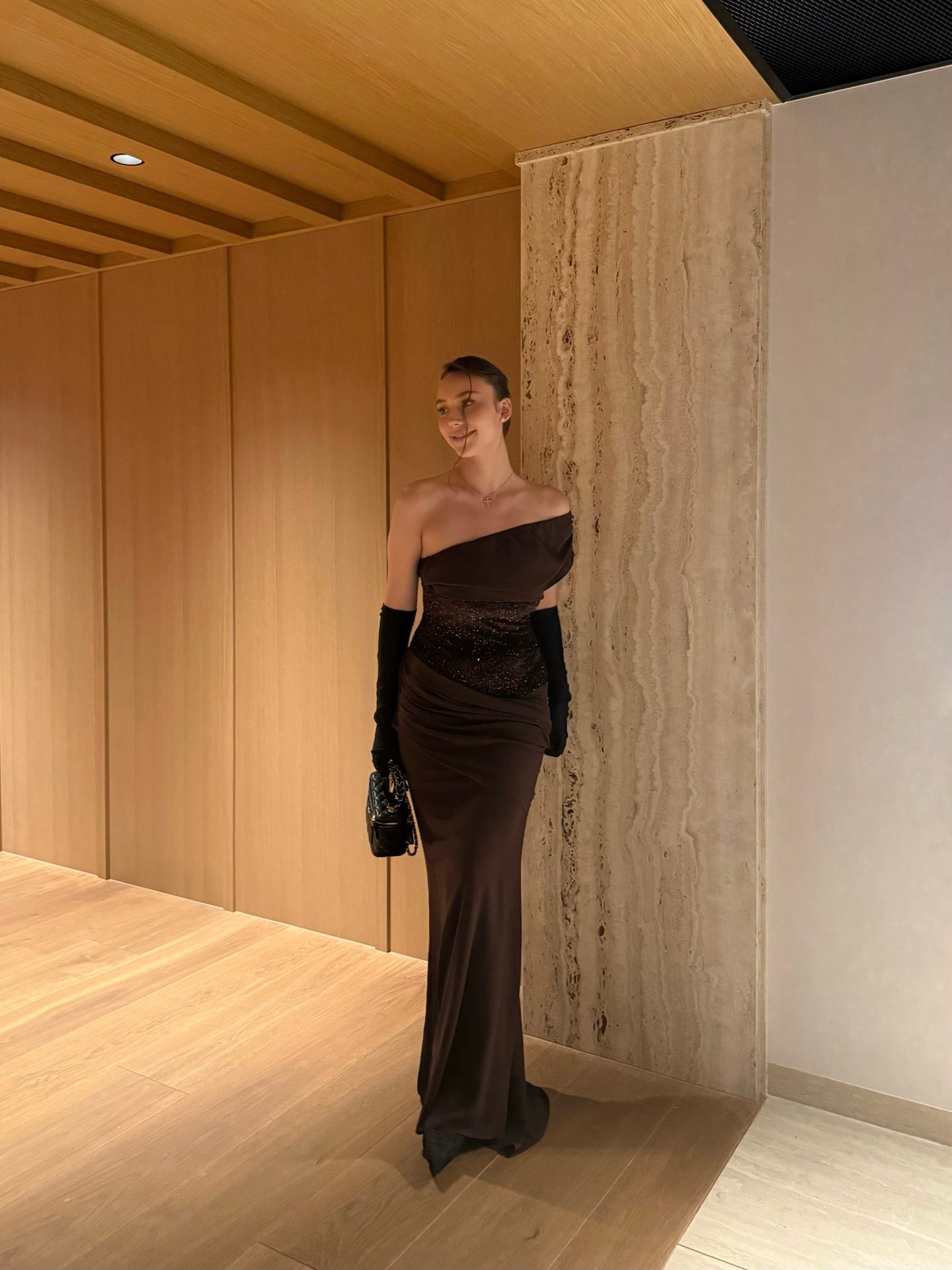 Bella Barnett — brown corset gown, frame 3