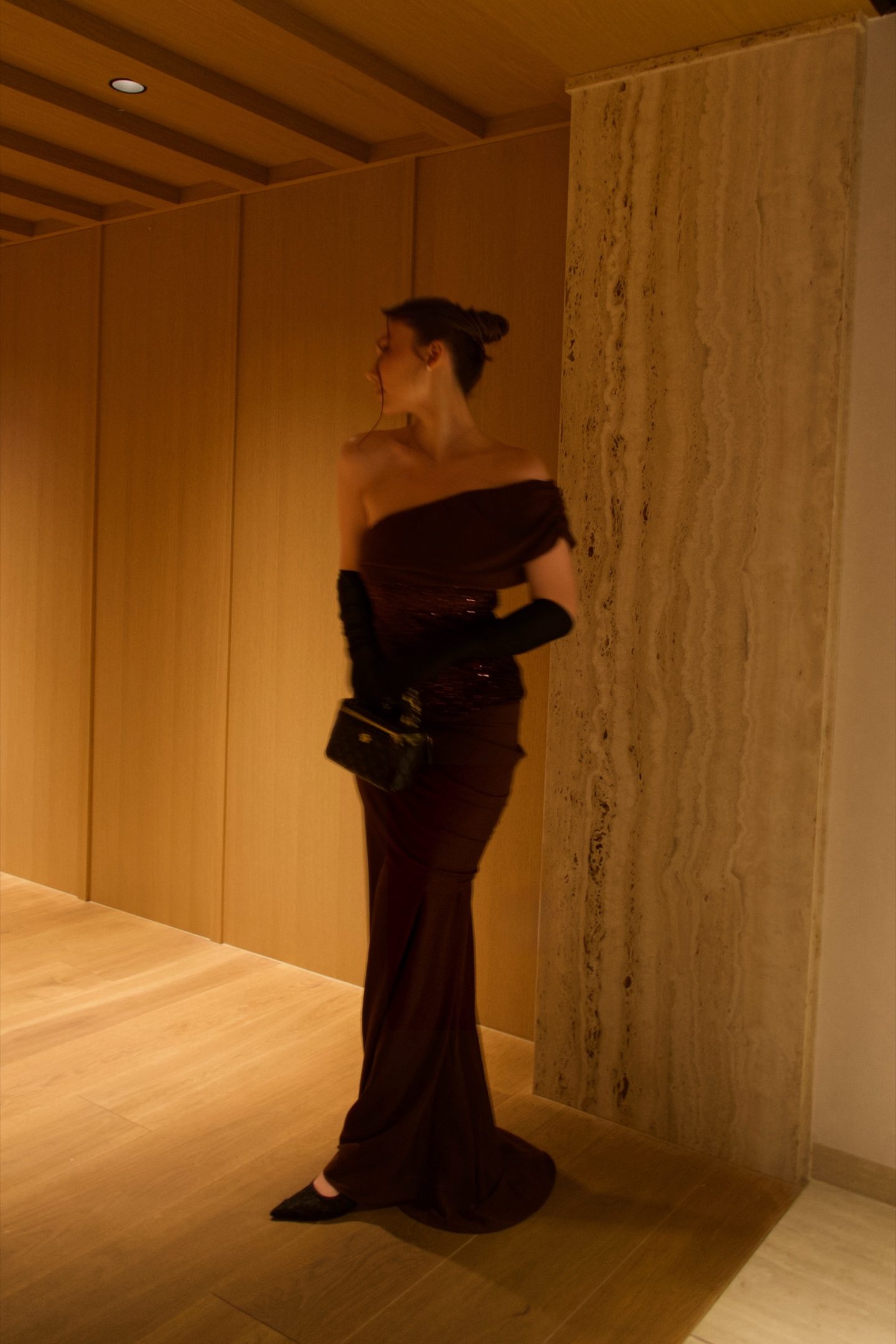 Bella Barnett — brown corset gown, frame 7
